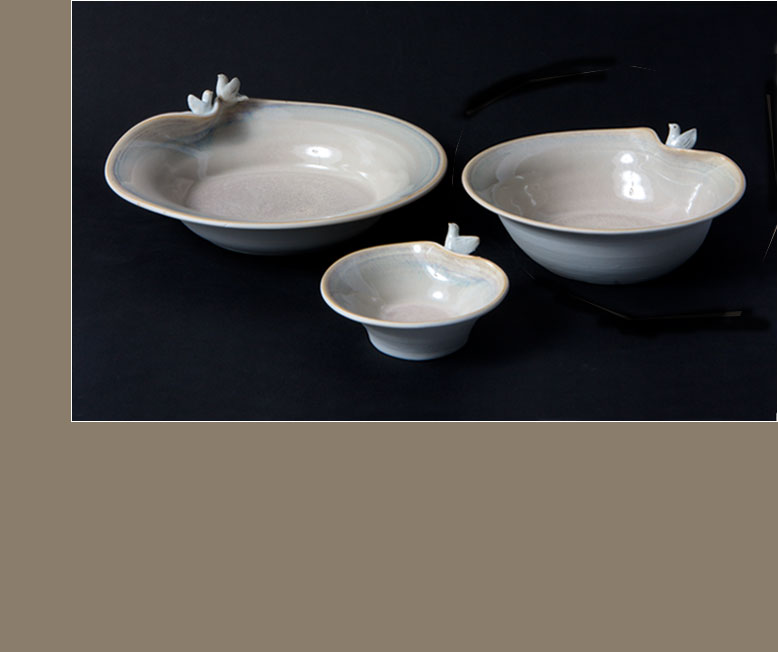 white porcelain dove bowls
